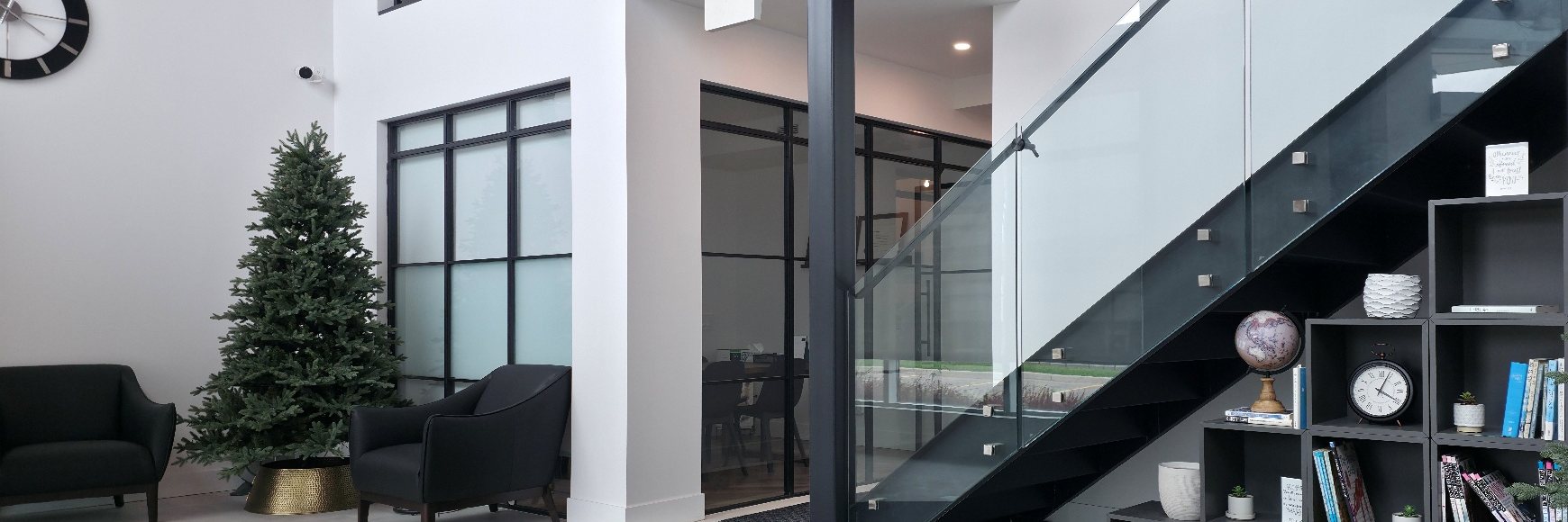 Reception area and stairwell at YD Law's Oakville office