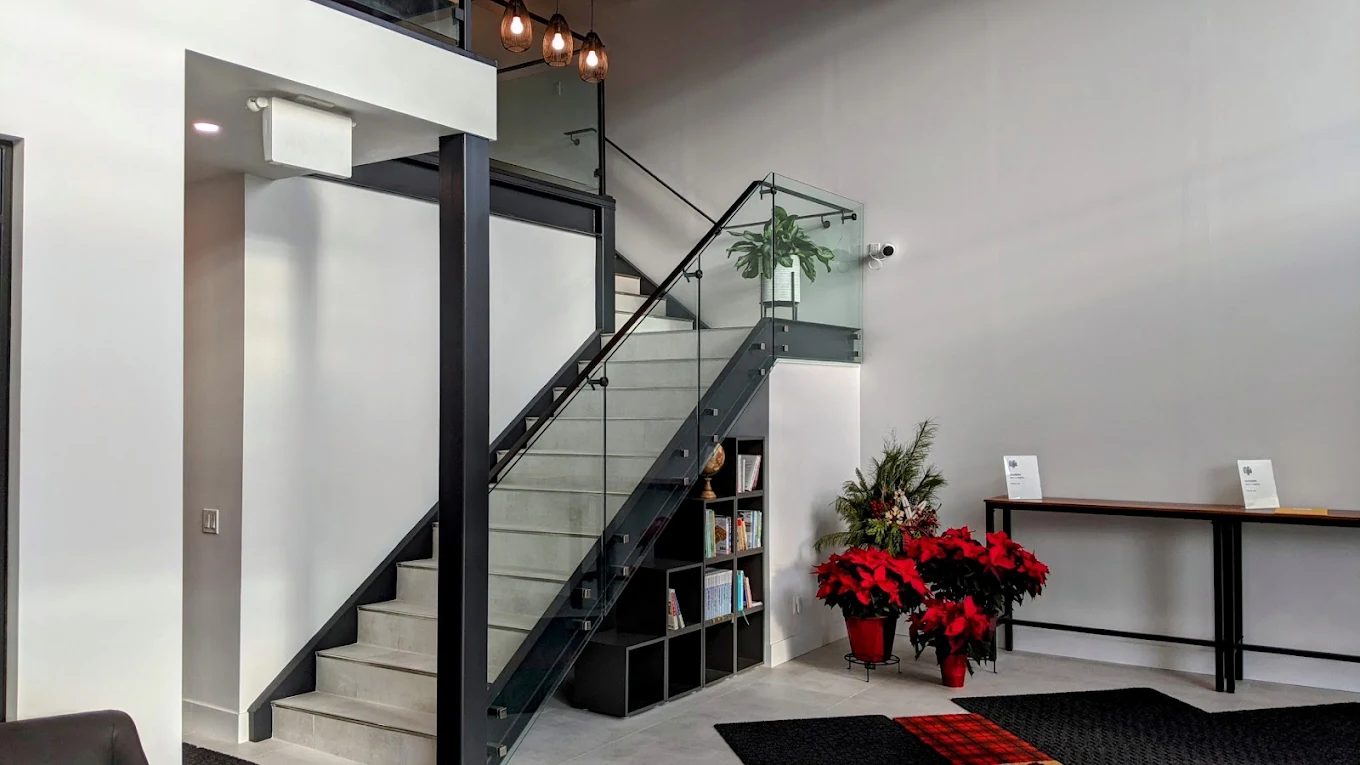 Stairwell and reading shelves in the reception area